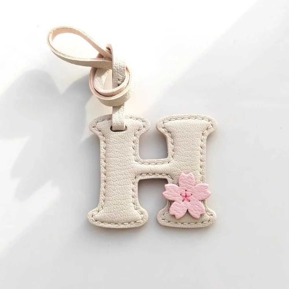 Luxury Creative High Quality Genuine Leather Initial Keychain Pendant Womens Fashion Candy Color Car Keychain Bag Phone Charm Gift Y250928