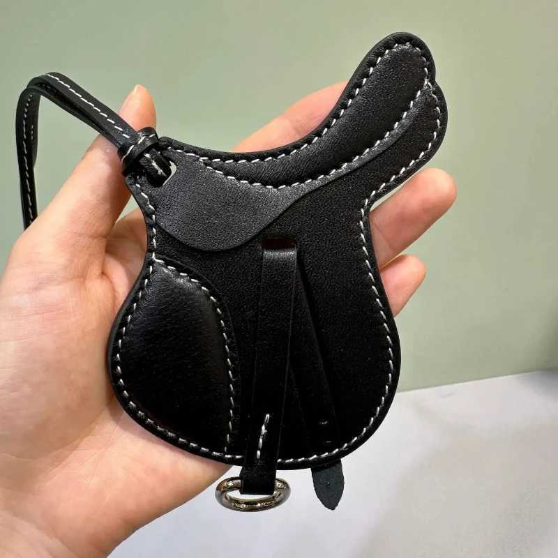 Luxury Luxury High Quality Bag Charm Saddle Bag Pendant Cute Car Key Chain Luxury Handmade Genuine Leather Sheepskin Bags Accessories Y250928