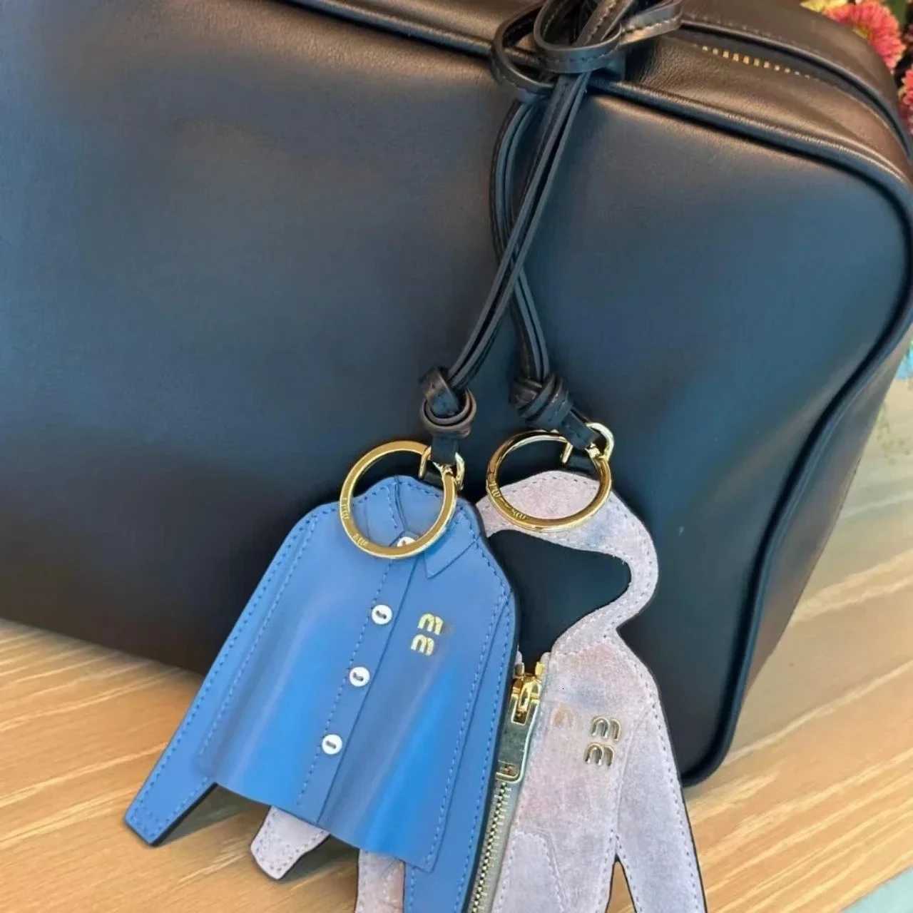 Luxury Blue shirt bag pendant leather pendant brand design mini ballet shoes jewelry bag charm clothing personalized pendant Y250928bg