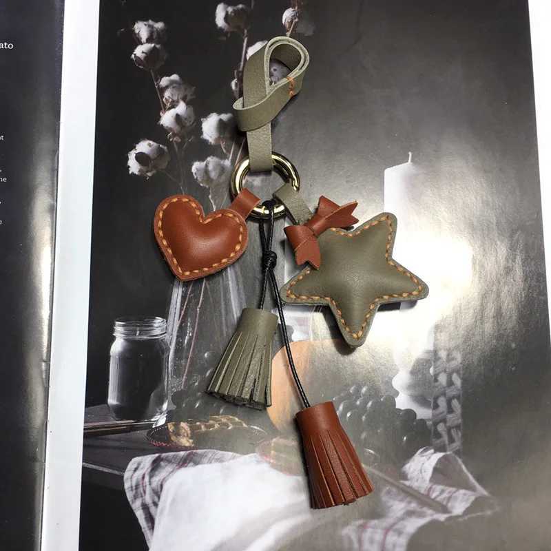 Luxury Handmade Cowhide Tassel Love Peach Heart Star Keychain Bag Hanging Creative Birthday Gift Pendant Car Pendant Y250928as
