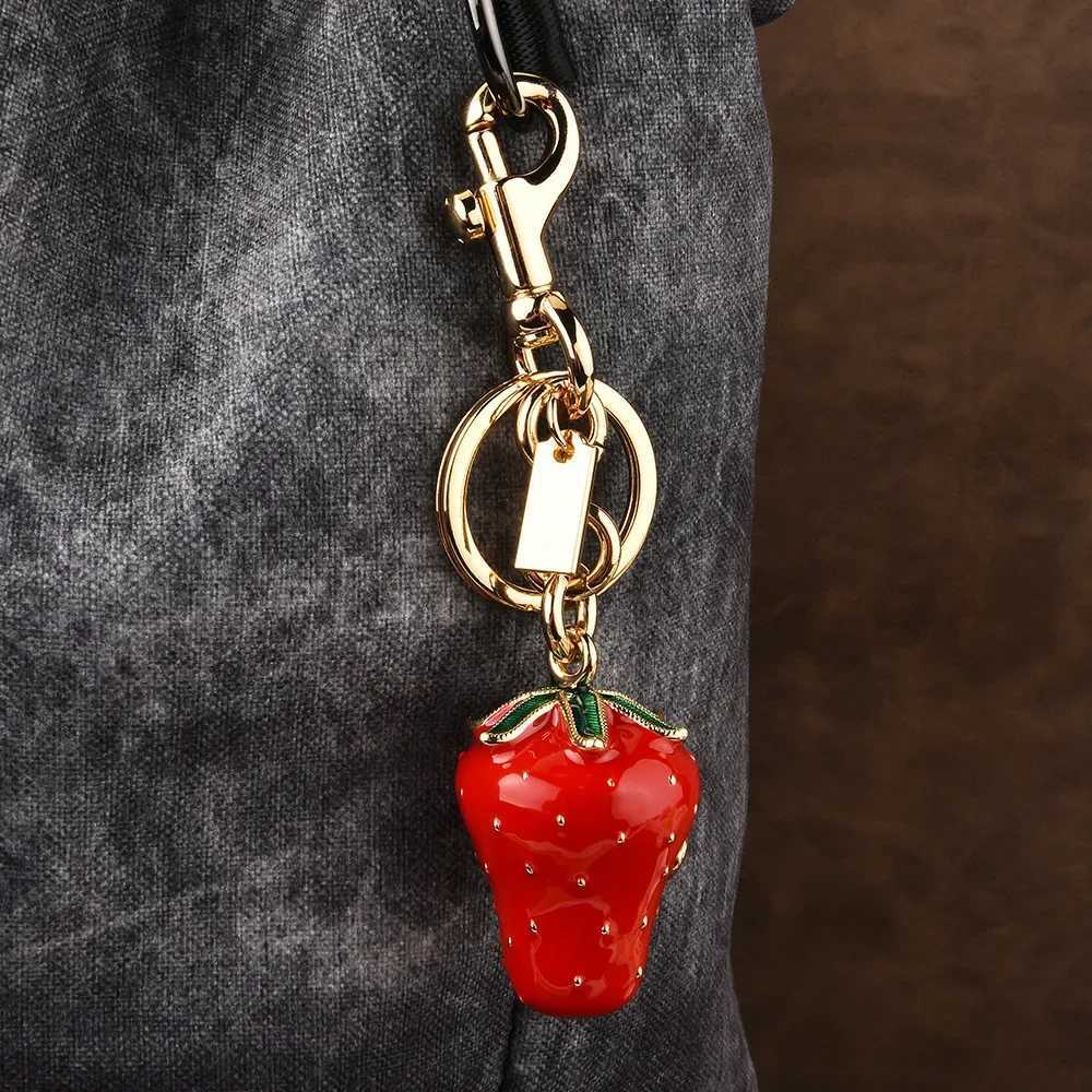 Luxury Artificial tree strawberry trend 2025 Womens keychain Golden Strawberry Series cherry bag Pendant Y250928as