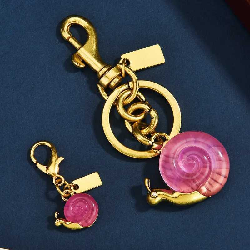 Luxury Snail bag pendant fashionable and personal keychain pendant accessory bag pendant Y250928as