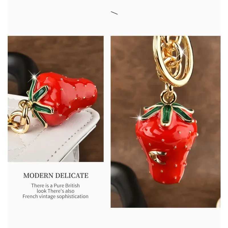 Luxury Artificial tree strawberry trend 2025 Womens keychain Golden Strawberry Series cherry bag Pendant Y250928