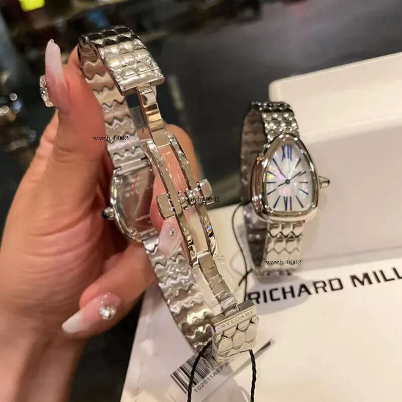 Fashionable personalized snake shaped antique style dia inlaid small dial light temperament women quartz watch