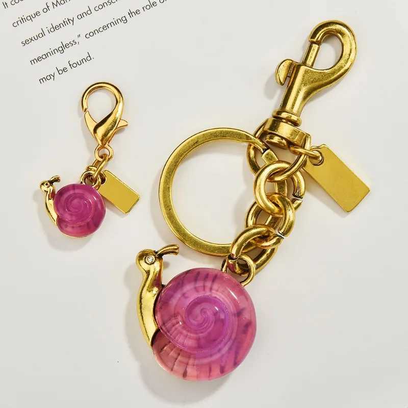Luxury Snail bag pendant fashionable and personal keychain pendant accessory bag pendant Y250928