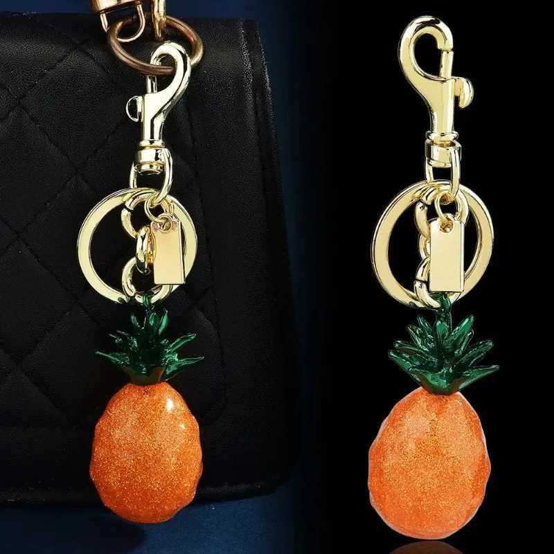 Luxury Cherry key chain handbag pendant 2025 bestselling multicolor pineapple fruit bag pendant Y250929as