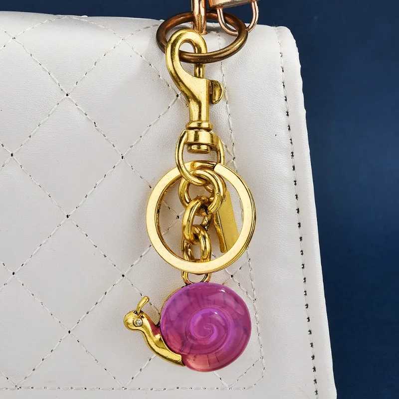 Luxury Snail bag pendant fashionable and personal keychain pendant accessory bag pendant Y250928as