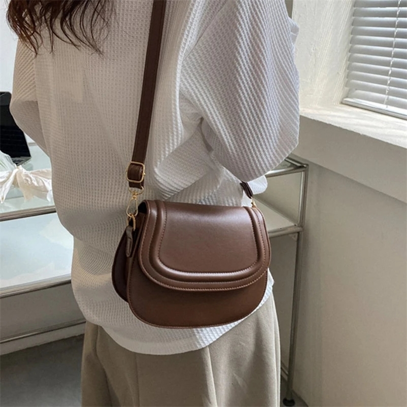 2024 Womens Single Shoulder Ten Font Small Bag Spring/Summer Simple Edition Handbag Ins Fashion Messenger Bag241018bj