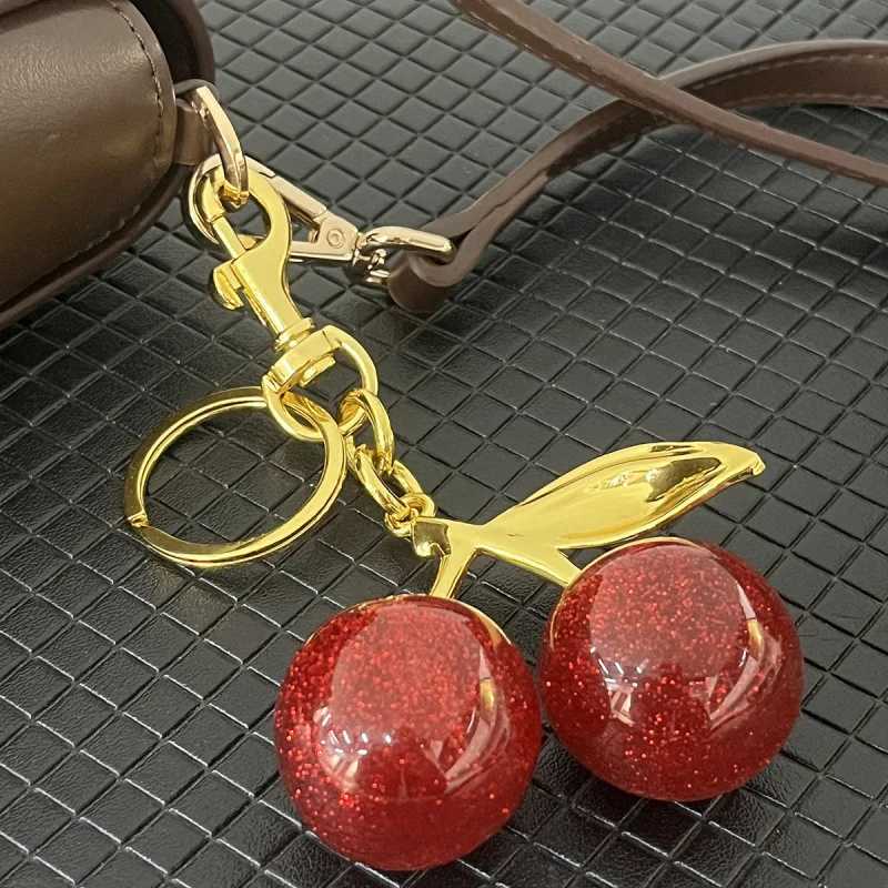 Luxury Decorative Ball Cherry Bag Pendant Keychain Glitter Pink Pendant Car Keychain Resin Accessories Bag Pendant advanced Y250928qf
