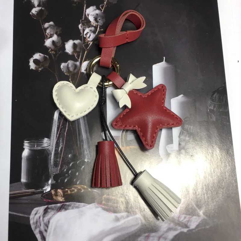 Luxury Handmade Cowhide Tassel Love Peach Heart Star Keychain Bag Hanging Creative Birthday Gift Pendant Car Pendant Y250928as