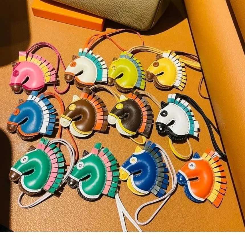 Luxury High Quality Leather Zebra Head Hand Sewn Pendant Creative Car Keychain Womens Leather Car Pendant Bag Charm Y250928