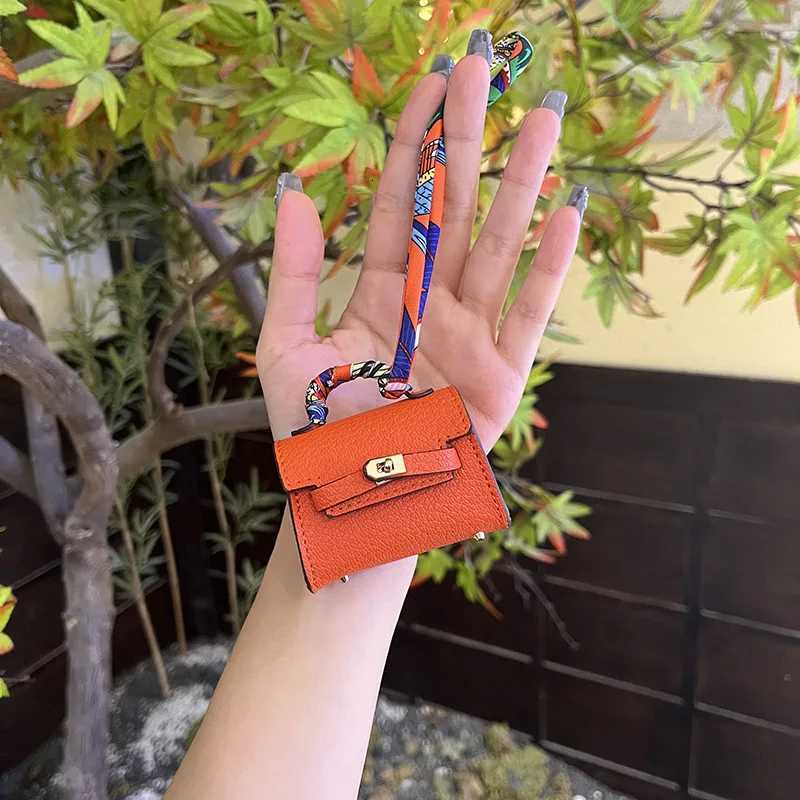 Luxury Mini long Kelly bag charm cute earphone pouch highquality leather creative car keychain ornament Y250929as