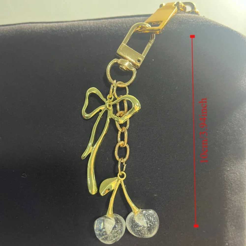 Luxury Fashion Delicious Red Cherry Bow Keychain Summer Fruits Cherries Pendant Keyring For Women Men Jewelry Bag Accessories Gift Y250928as