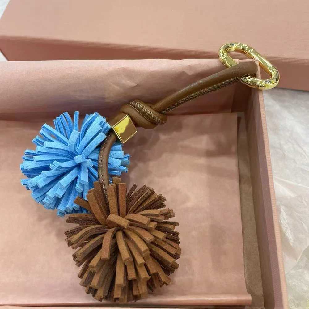 Luxury Flower Ball Leather Pendant Cowhide Rope Bags Luxury Design Charm Keychain Car Pendant For Woman Bag Accessories Handbag Y250928