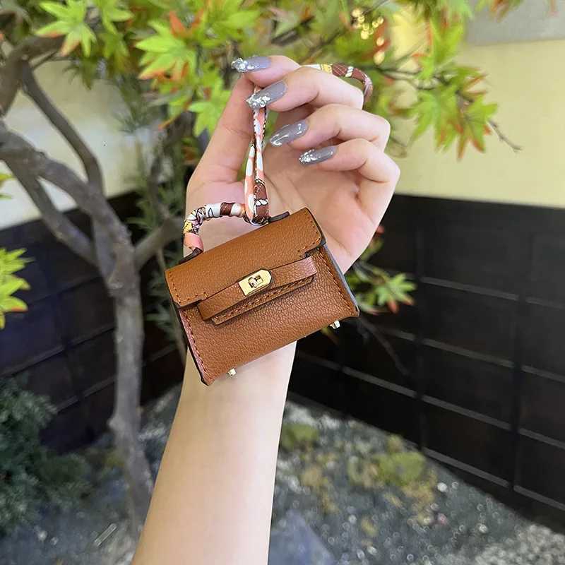 Luxury Mini long Kelly bag charm cute earphone pouch highquality leather creative car keychain ornament Y250929as