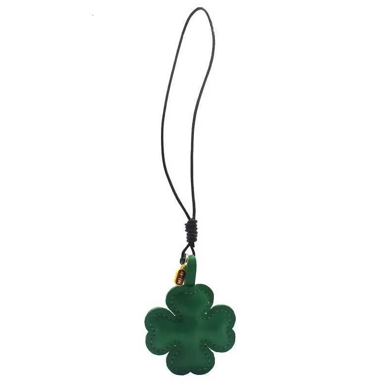 Luxury Doublesided Fourleaf Clover Genuine Leather Ins Bag Pendant Keychain Car Pendant Cowhide Plant Leaf Handbook Y250928as