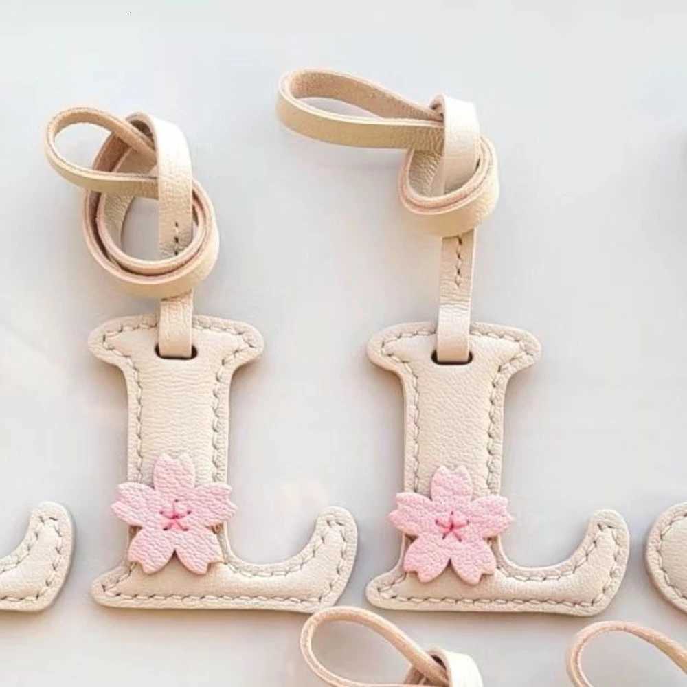 Luxury Creative High Quality Genuine Leather Initial Keychain Pendant Womens Fashion Candy Color Car Keychain Bag Phone Charm Gift Y250929as