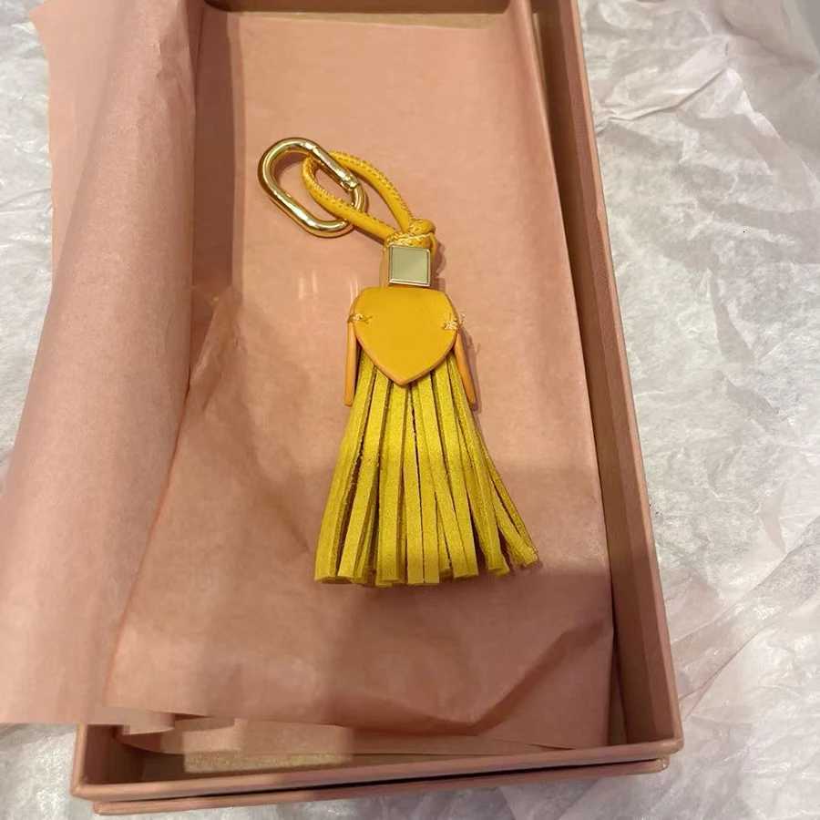 Luxury Flower Leather Bags Charm Ornaments Cowhide Flower Advanced Decorative Hanging Bag Accessories Tassels Car Handbag Y250928as