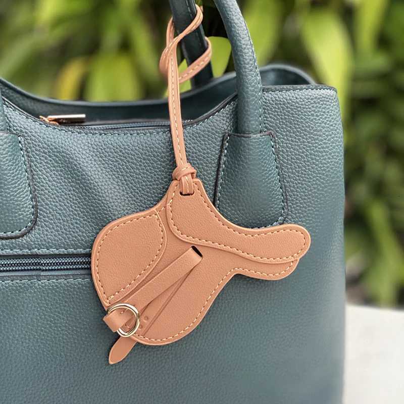 Luxury Fashion Soft Leather Saddle Bag Charm Hanging Decoration Ornament Bag Ornaments For Lady Handbag Bag Accessories Y250929as