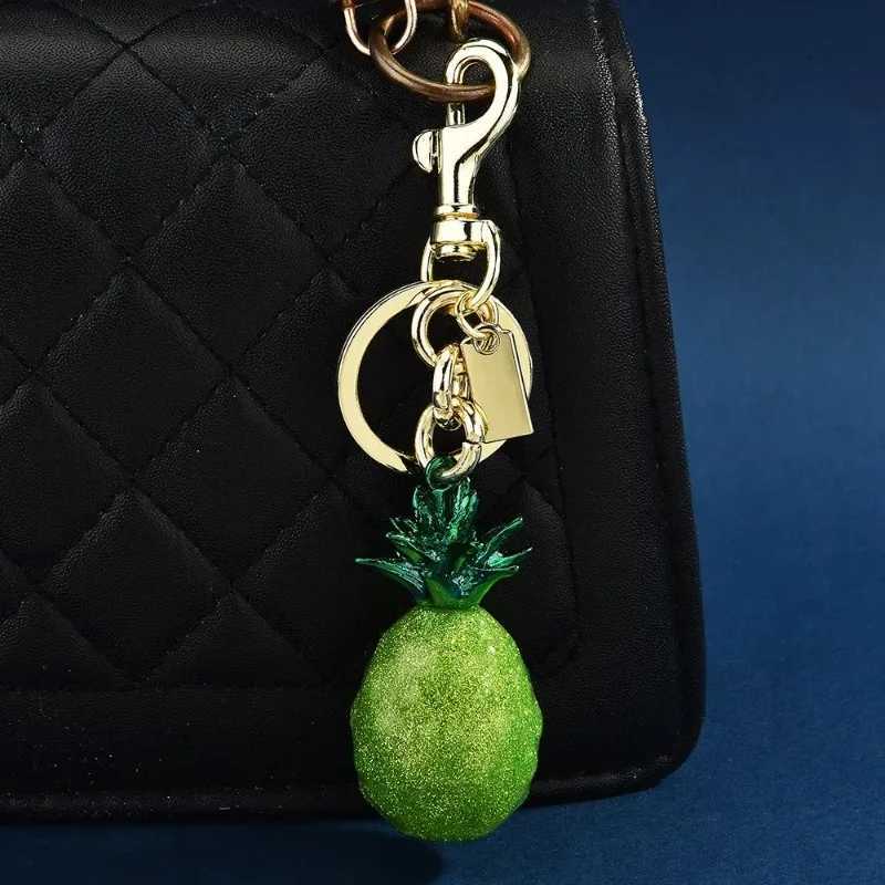 Luxury Cherry key chain handbag pendant 2025 bestselling multicolor pineapple fruit bag pendant Y250929as
