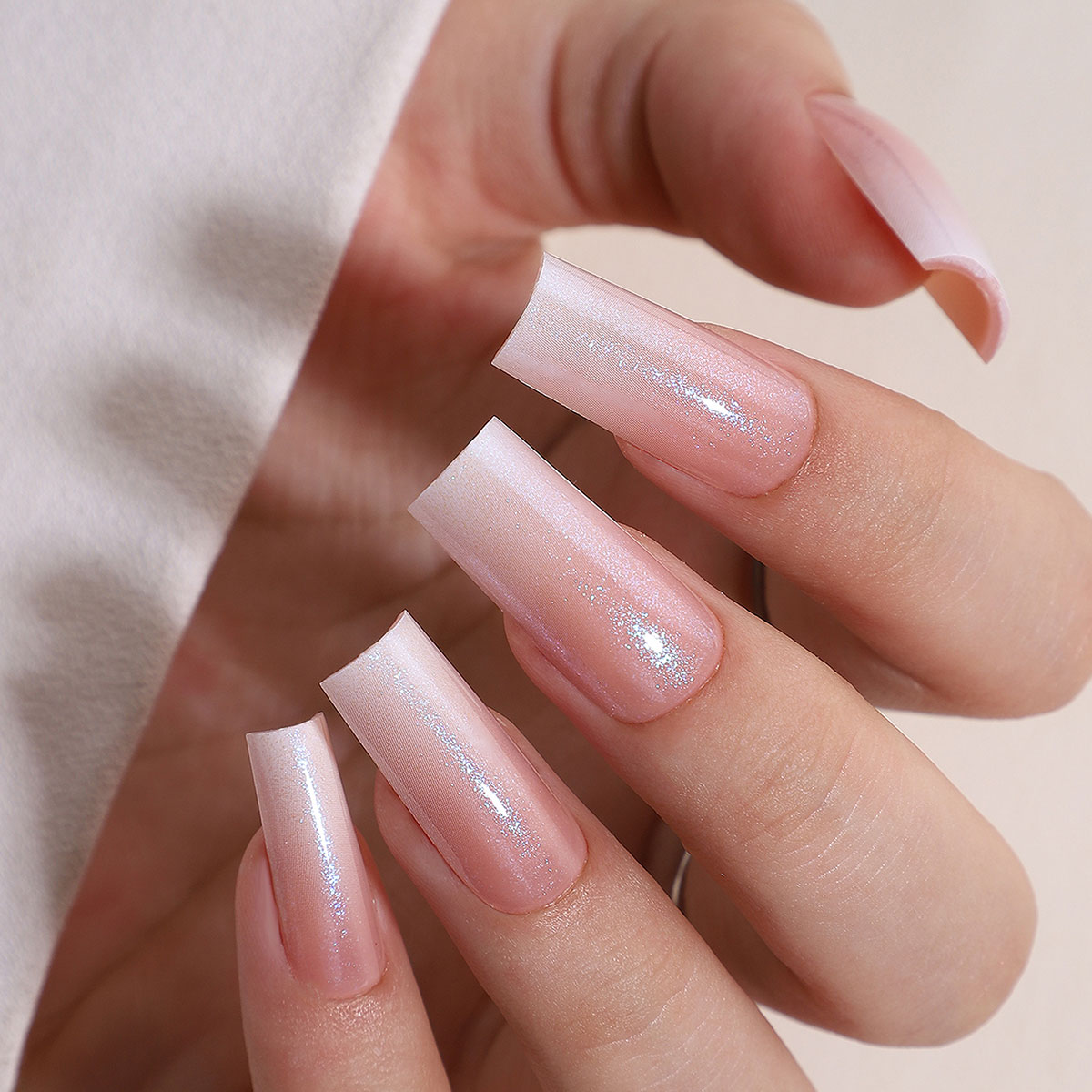 a long style press on nail gel set in the aurora gradient shiny style including adhesive 16 size options and 32 press on false nails