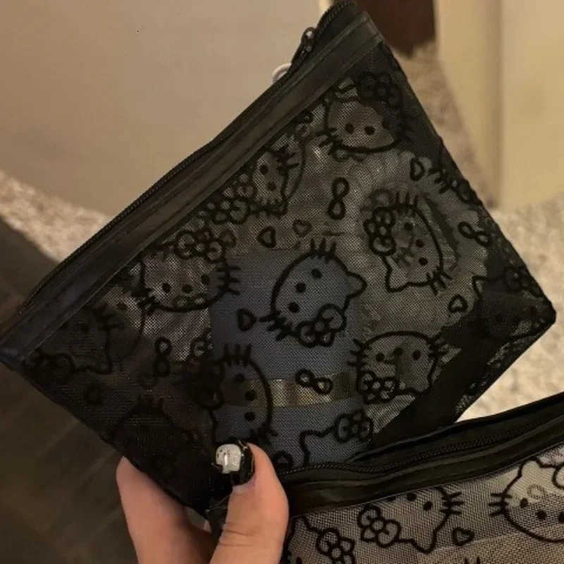 Sanrio New 2025 Hello Kitty Mesh Material Storage Bag Portable Zipper Coin Purse Creative Earphone Bag Cute Girls Cosmetic Bag L250929
