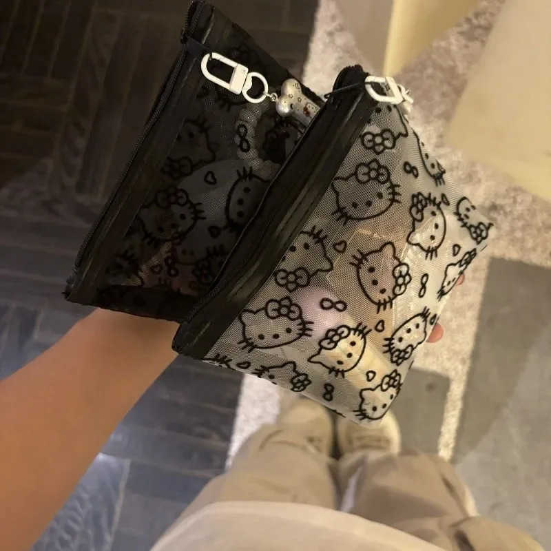 Sanrio New 2025 Hello Kitty Mesh Material Storage Bag Portable Zipper Coin Purse Creative Earphone Bag Cute Girls Cosmetic Bag L250929