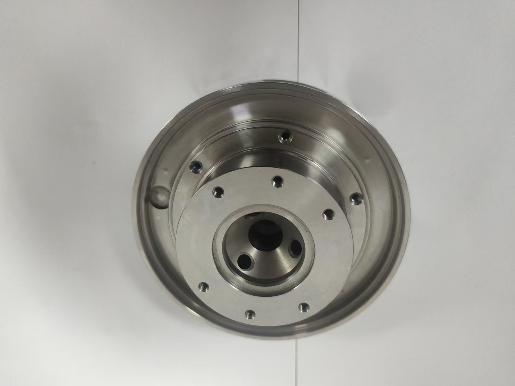 Common Tools Stainless Steel Precision Machined Circular Manifold with Multiple Cavities and Threaded Holes H06