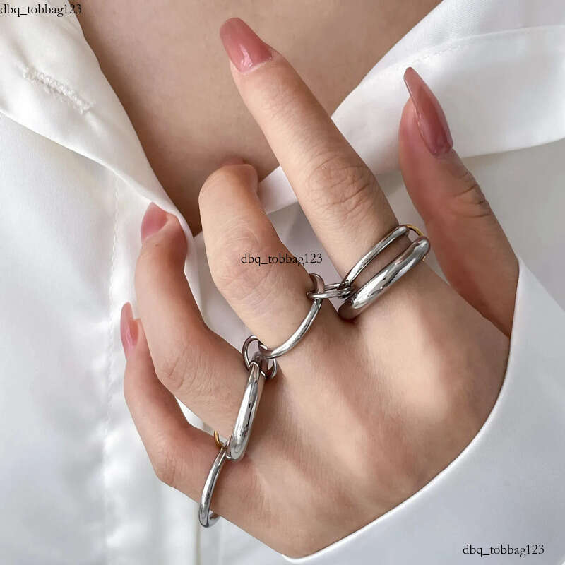 Elegant Designer Rings: 4-Piece Fashion Spinelli Rings Set with Dia-like Stones in Gold, Overlapping Design, Adjustable Size, Unisex Jewelry aaa