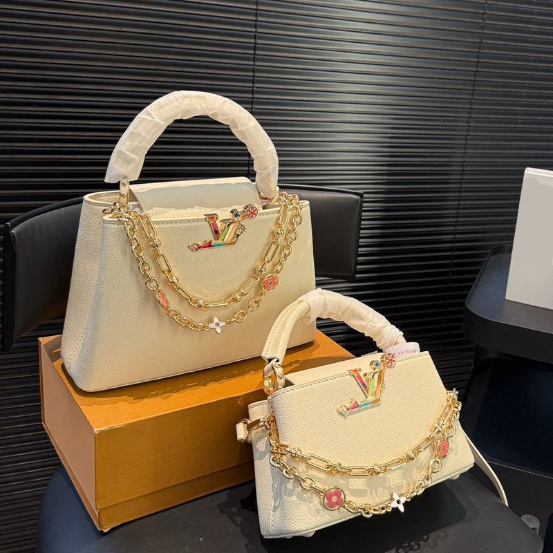 Designer bags, Adorned Gold toned Chain Straps.Ideal for Adding a Pop of Color and Luxury Flair to Any Outfit High quality handbag.