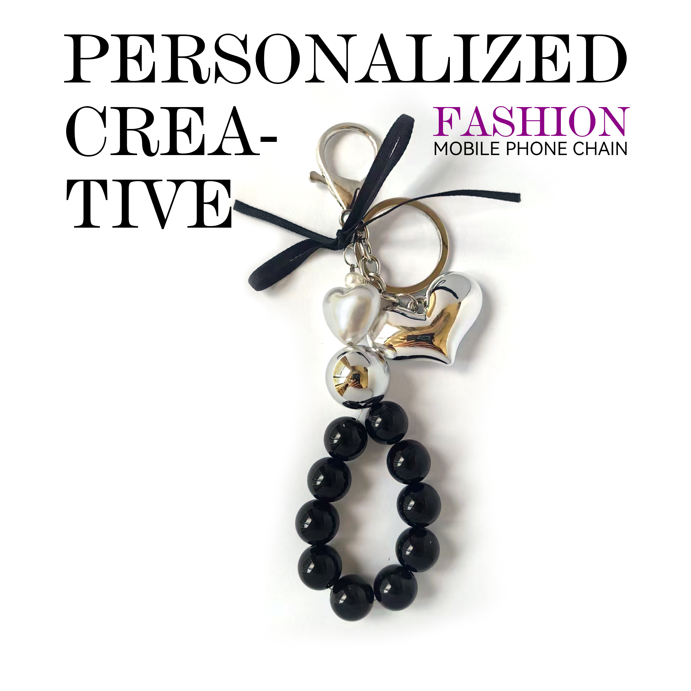 Fashion-forward phone charm, metal heart design, metallic pearls, black pearl strand, trendy accessory, anti-loss feature, easy to carry