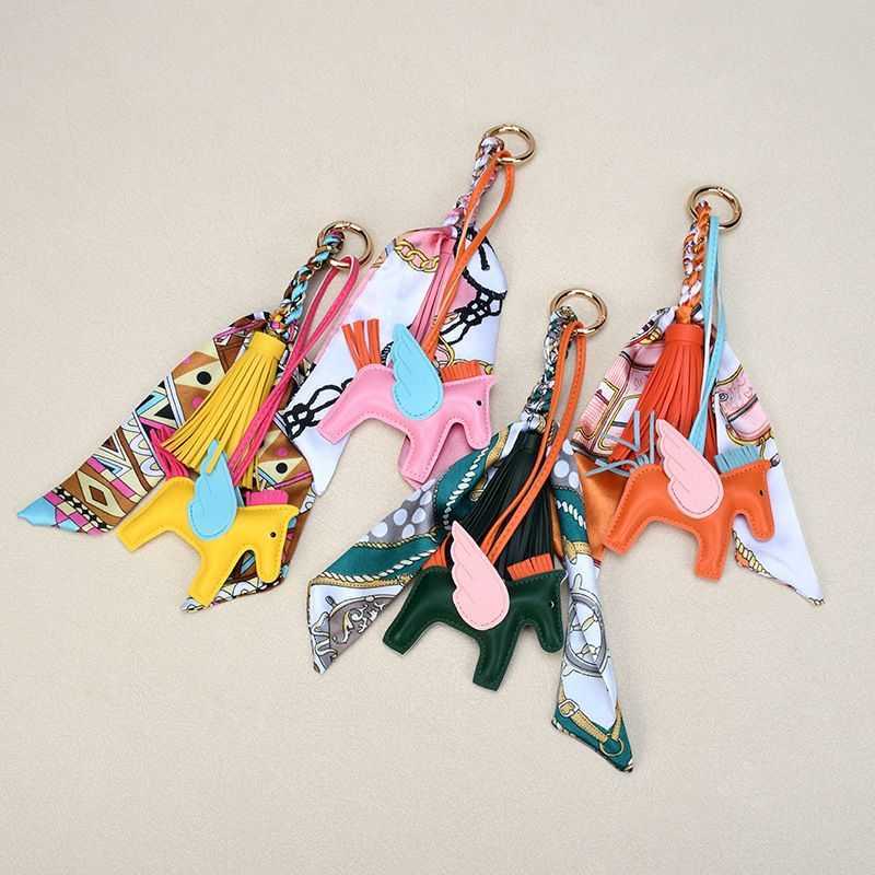 Luxury Chic Womens Travel Scarves - Handcrafted Silken Fabric with Faux Fur Trim and Pony Enamel Wristlet Embellishment Z260130