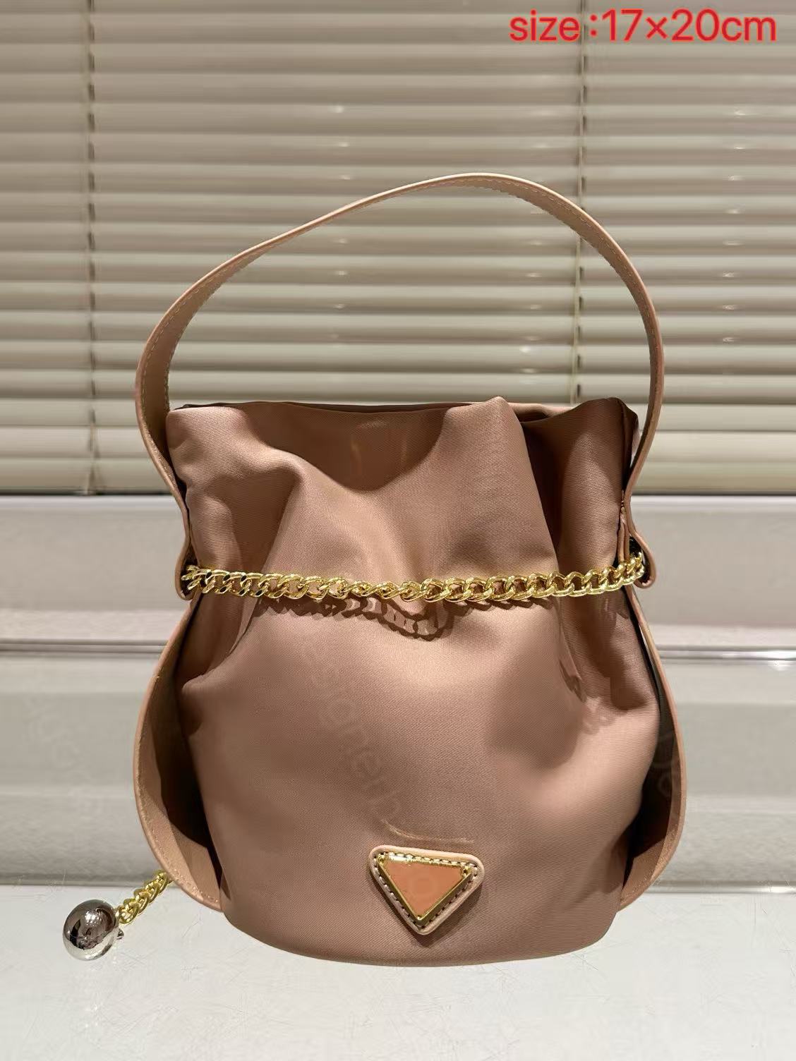 Luxury Bag designer bucket bag classic inverted triangle design with noble temperament chain ball hanging rope design Designer Bag Fortune Bag luxury bag suede bag