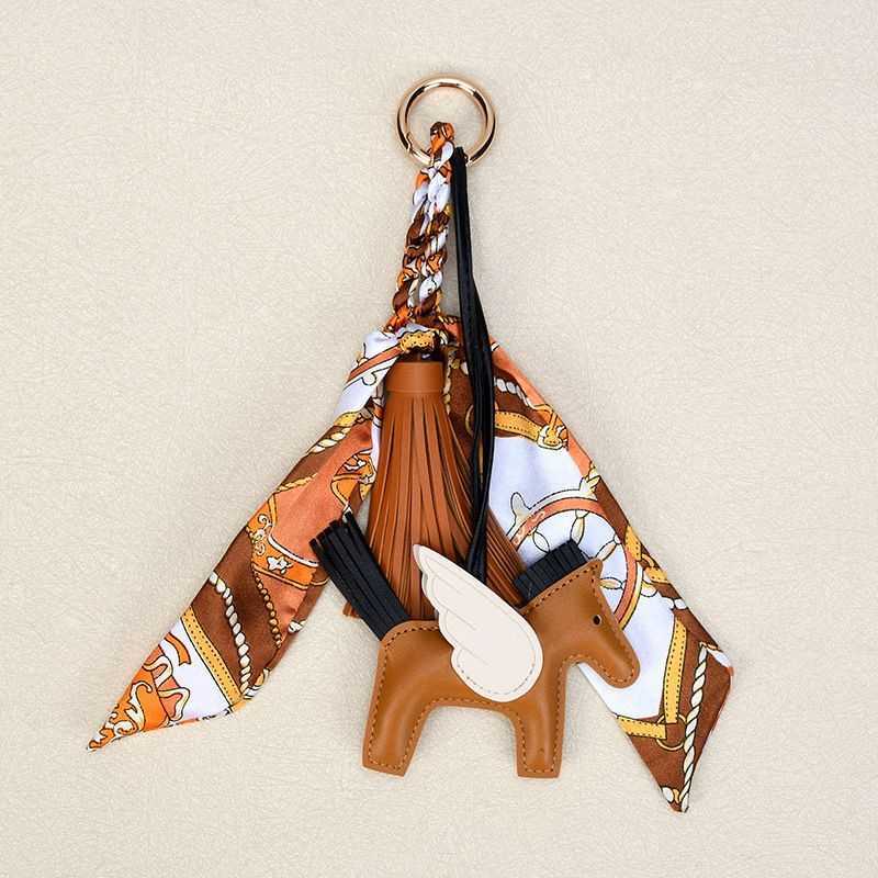 Luxury Chic Womens Travel Scarves - Handcrafted Silken Fabric with Faux Fur Trim and Pony Enamel Wristlet Embellishment Z260130