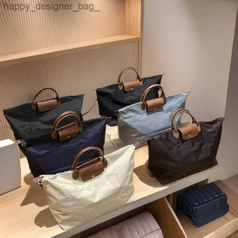 Bag Handheld Travel Bag Nylon Waterproof Dumpling Bag with Cowhide Large Capacity Luggage Bag Single Shoulder Crossbody Bag T250930