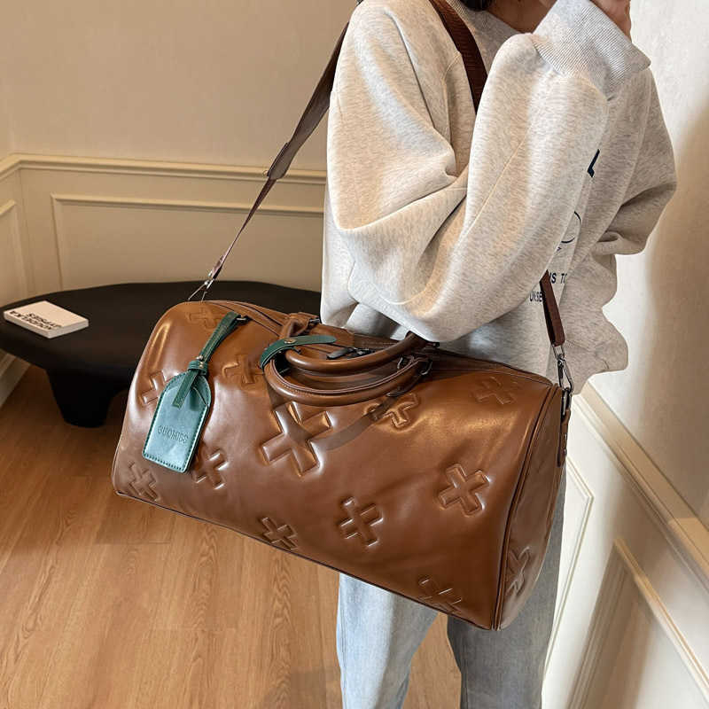 Fashionable PU embossed travel bag, women's handheld large capacity boarding bag, business travel sports, dry wet separation storage, fitness bag