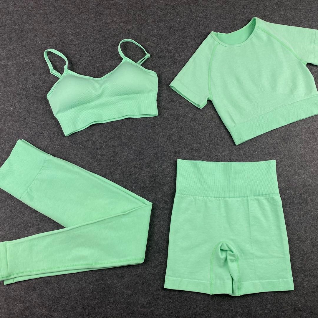 European and American women's solid color Instagram style seamless knitted yoga style tight four piece set for spring and autumn fitness clothing
