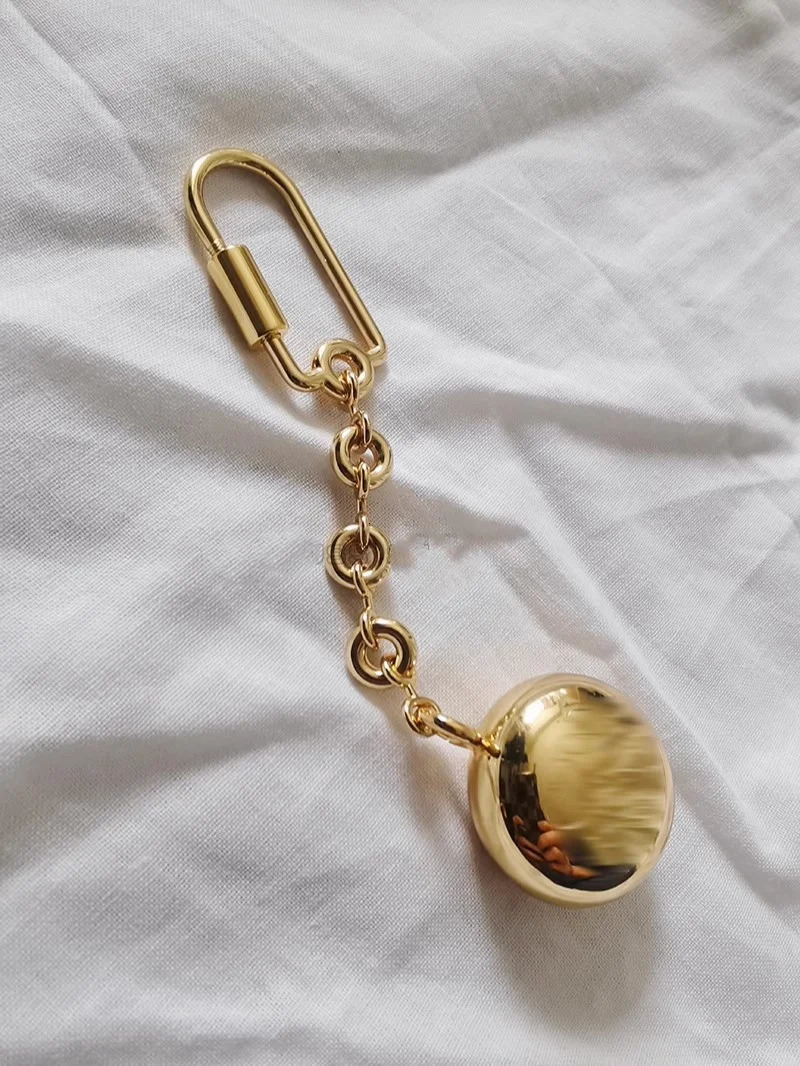 Brass embossed carving A gram pebble small gold ball ring chain keychain bag pendant hand rope 250102