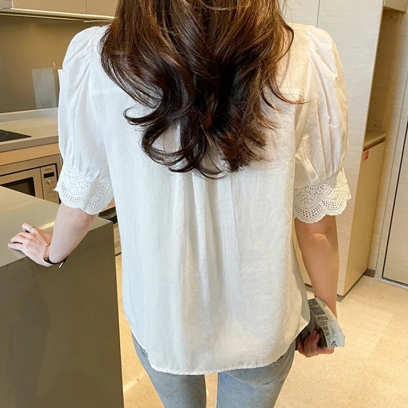 Summer lace embroidered womens shirt fashionable hollow elegant white shirt retro casual half sleeved top blue 13102 250102