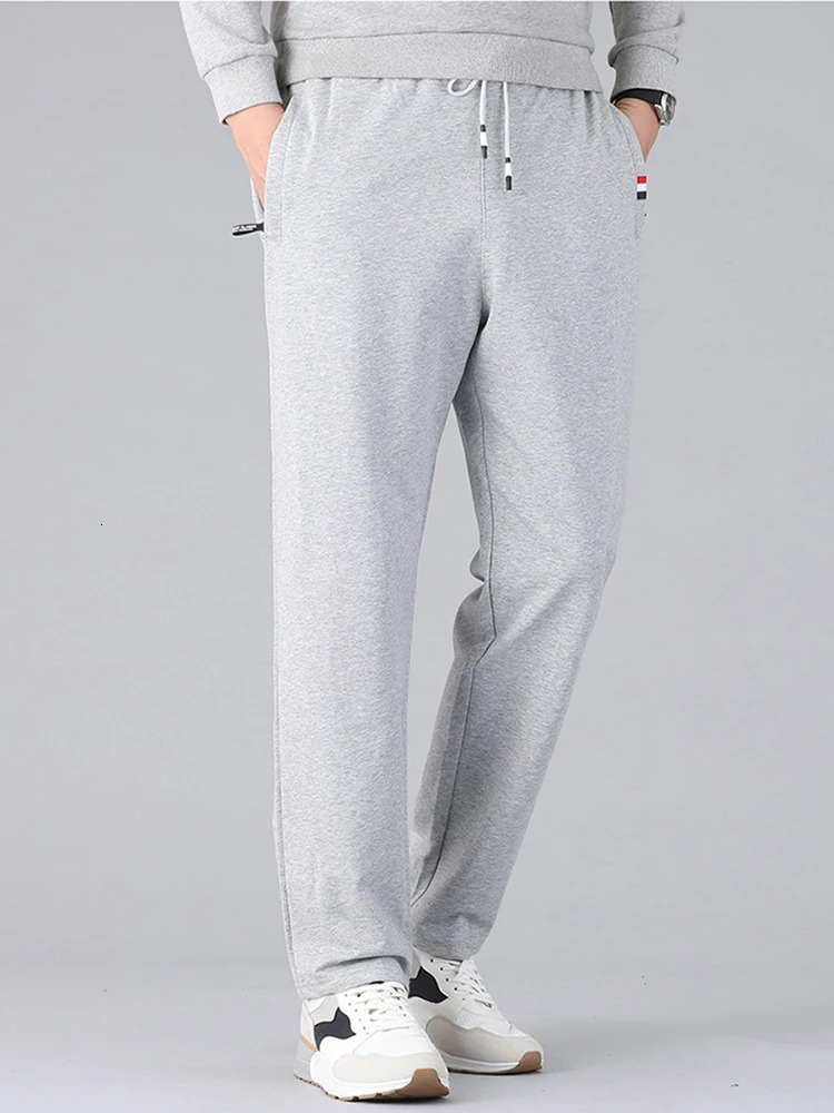 Spring Autumn Men Sweatpants Sportswear Fitness Gym Straight Cotton Track Pants Male Loose Joggers Trousers Plus Size 8XL 250103