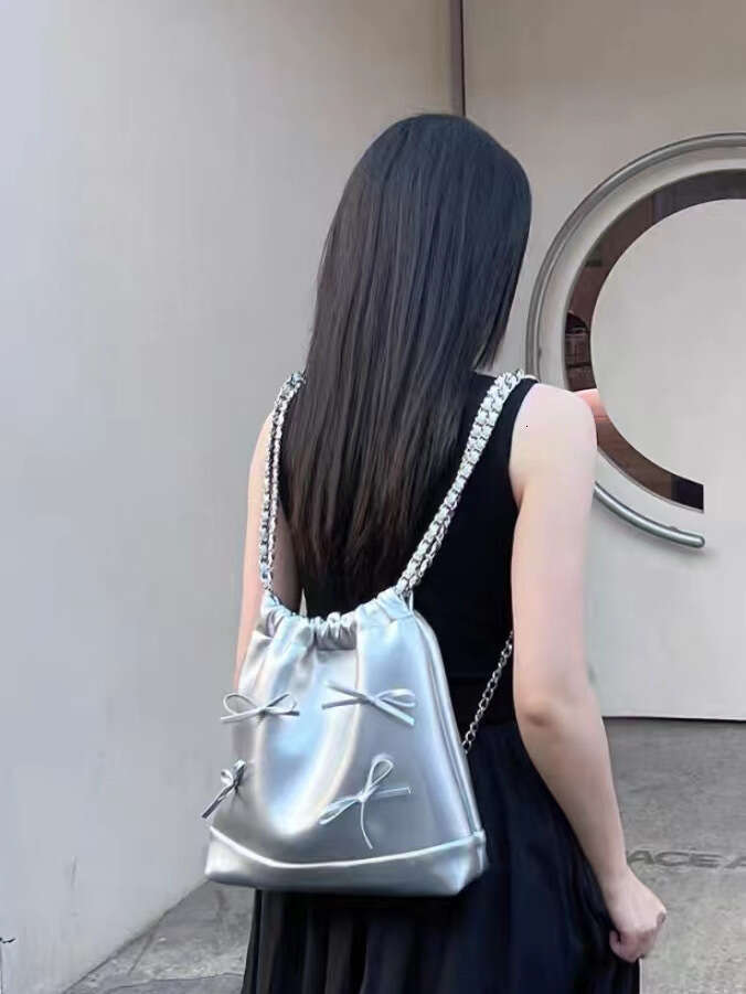 2025S Designer S New Model Y K Drawstring Bow Bag Soft Leather Cute Backpack One Shoulder Large Capacity Versatile Commuting Bag