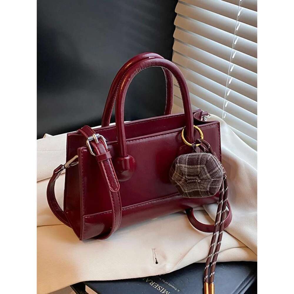 New Women s Burial Bag Autumn Winter New Solid Handheld Zipper Gloss Bag Advanced Fully Matched Commuter Shoulder Bag bag