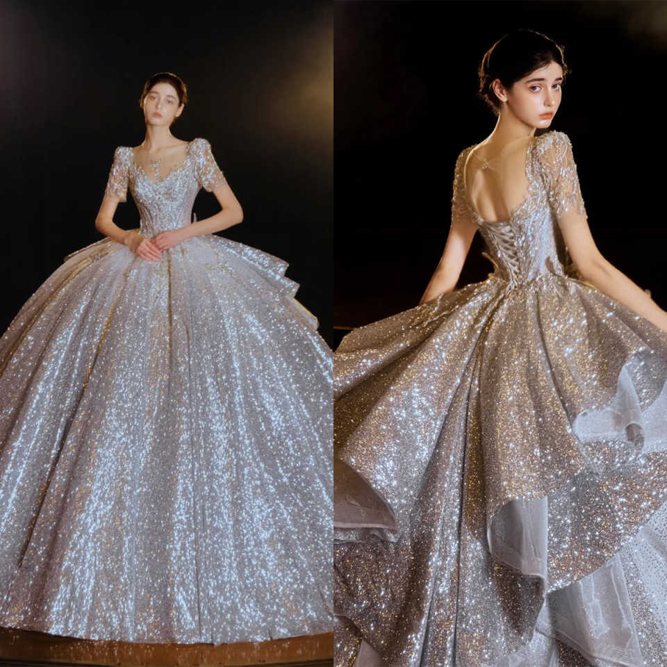 Luxury Ball Gown Wedding Dresses Sweetheart Short Sleeve Lace Net Appliqued Sequins Sweep Floor Cathedral Bridal Gowns Arabian Dubai Custom Made Vesti