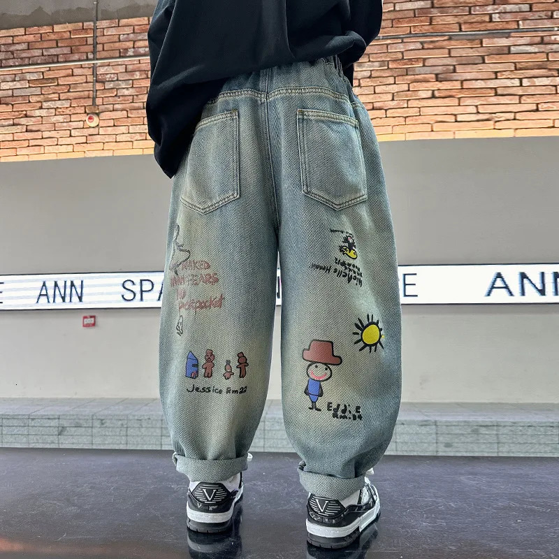 Spring Autumn Childrens Boys Graffiti Jeans Cartoon Printed Stretch Loose Versatile Baby Boys Pants Kids Boys Denim Pants 250103