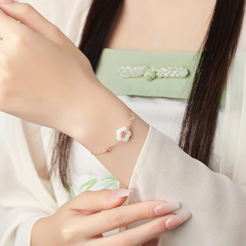 Butterfly sterling silver white jade womens niche light zircon bracelet Ins style plum blossom bracelet 250102