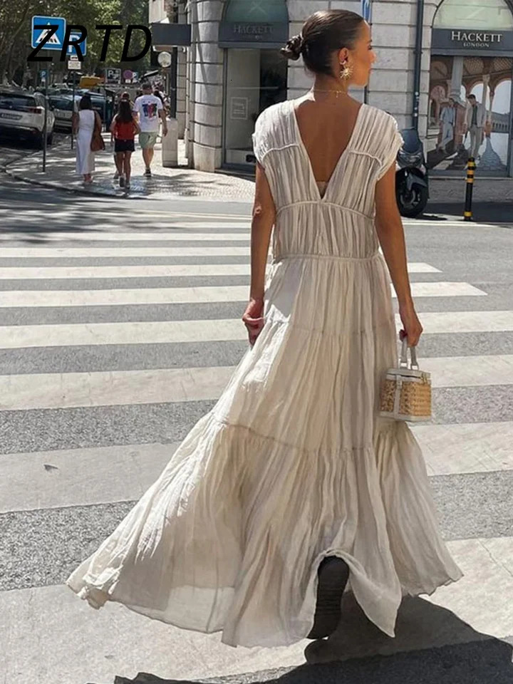 Elegant ruffled backless long party dress for women loose O-neck sleeveless high waisted womens dress 2025 spring womens solid robe 250103