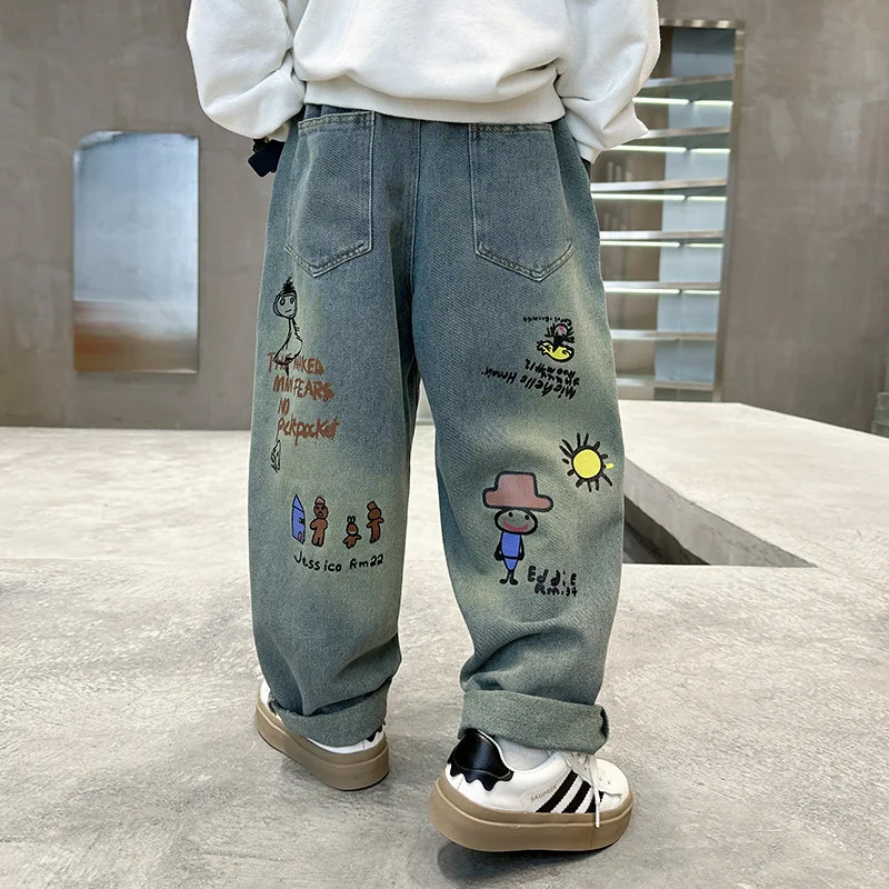 Spring Autumn Childrens Boys Graffiti Jeans Cartoon Printed Stretch Loose Versatile Baby Boys Pants Kids Boys Denim Pants 250103