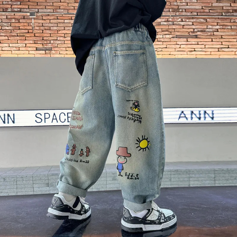 Spring Autumn Childrens Boys Graffiti Jeans Cartoon Printed Stretch Loose Versatile Baby Boys Pants Kids Boys Denim Pants 250103