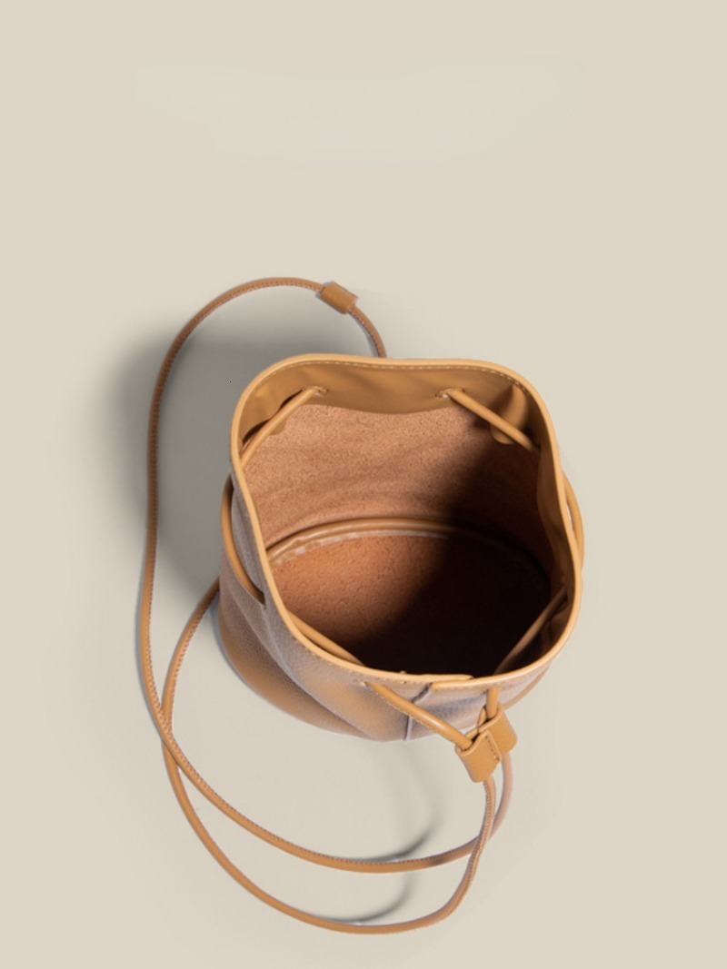 Fashion Cowhide Minority All-Match Casual Messenger Bags New Drawstring Solid Bucket Simple Commuter Exquisite Single-Shoulder