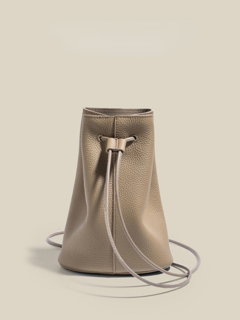 Fashion Cowhide Minority All-Match Casual Messenger Bags New Drawstring Solid Bucket Simple Commuter Exquisite Single-Shoulder